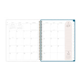 monthly spread featuring blank writing space, grey note taking section, and white monthly tabs