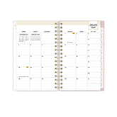 2026 planner featuring a monthly spread with lined writing space, monthly tabs, and reference calendars