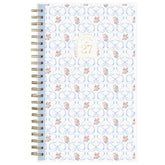 5x8 planner with bow pattern and floral accents on a white background for 2027