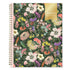 A spiral-bound 2027 floral planner shown closed, featuring a dense multicolor wildflower pattern on a dark green background with a gold &