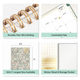 A 2x2 feature collage for a spiral-bound planner notebook. The top-left panel shows gold-toned twin-wire binding, the top-right shows laminated monthly calendar tabs, the bottom-left shows the planner closed with floral pattern and dimensions, and the bottom-right shows sticker sheets and a storage pocket.