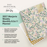 A 2027 Marjorie Weekly Monthly 8.5x11 Planner by Day Designer for Blue Sky, shown open with floral cover pages and gold foil details on a light cream background with gold sticker sheet
