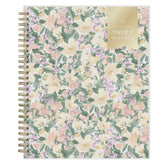 A spiral-bound 2027 daily planner with a pastel floral cover pattern featuring pink, purple, and green flowers on a cream background, with a gold label on the top right.