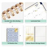 A 2x2 product feature collage for a spiral-bound planner notebook. The top-left panel shows gold twin-wire binding; the top-right shows laminated monthly calendar tabs; the bottom-left shows the closed notebook with a blue-and-white damask pattern and dimensions labeled 7 x 9 inches; the bottom-right shows sticker sheets and a storage pocket inside the notebook.