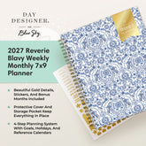 Day Designer for Blue Sky 2027 Reverie Blavy Weekly 7x9 Planner shown at an angle on a light cream background with a mint green text panel. The planner features a blue and white floral damask pattern, a gold accent sticker, and a gold spiral binding.