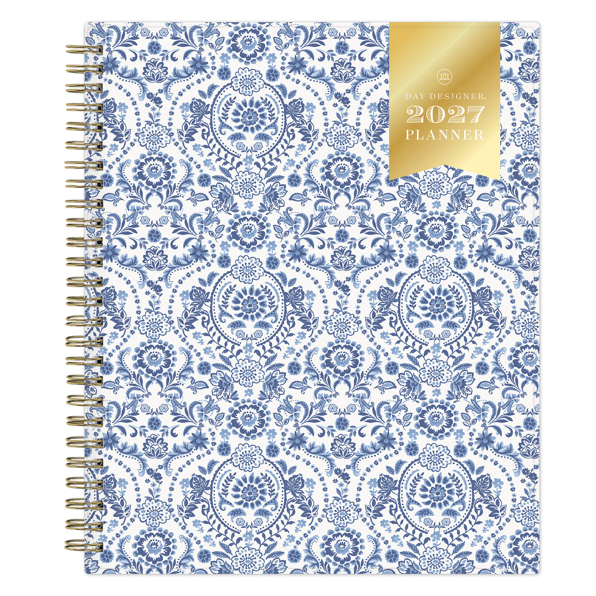 A 2027 spiral-bound weekly monthly planner with a white cover decorated in a blue floral and ornamental pattern, featuring a gold foil seal on the top right that reads &