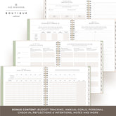 Day Designer Boutique edition spiral-bound planner shown open to multiple interior pages, including reflection, personal check-in, annual goals, and budget tracking pages.