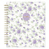 A spiral-bound non-dated daily planner with a white cover decorated with a repeating pattern of purple roses and green leaves, featuring a round lavender sticker with gold foil text that reads &