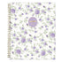 A spiral-bound weekly monthly planner with a white cover decorated with a repeating pattern of purple roses and green leaves. A lavender circular sticker with gold foil text reading &