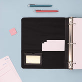 1.5" pro view binder featuring a clear front cover for presentations, projects, etc. 3 hole binder and wrapped in faux leather with storage pockets and business card holder, and pen loop