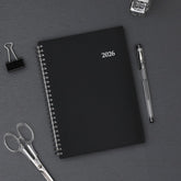 2026 planner featuring black cover in 5.875x8.625 planner notes format