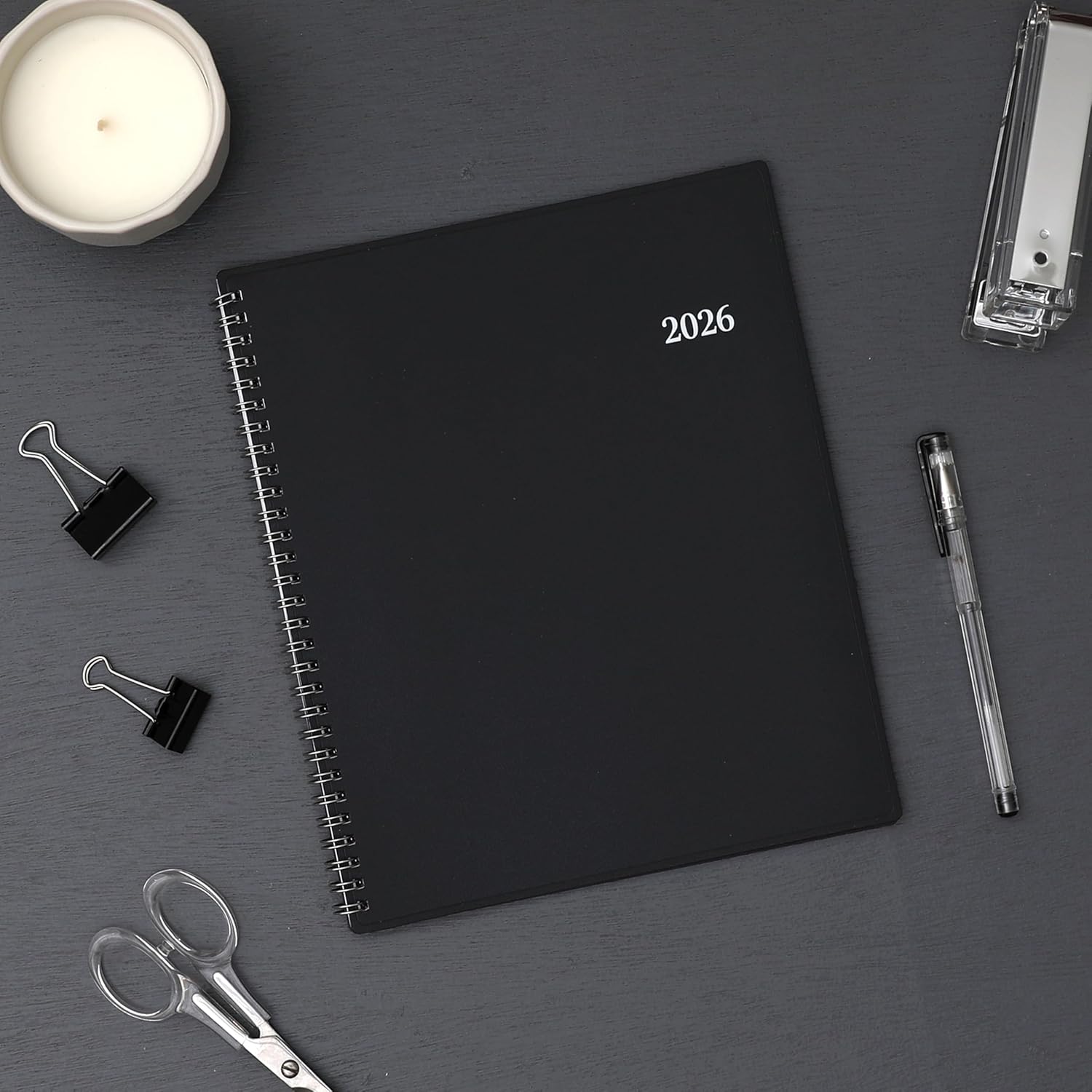 2026 planner featuring black back cover in 8x10 planner notes format weekly