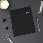 2026 planner featuring black back cover in 8x10 planner notes format weekly