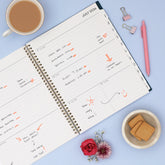 Planner with floral designs on &