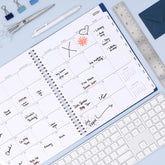 Blue gradient agenda monthly planner label on a white background with monthly layout filled out with plans