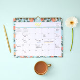 2026-2027 monthly calendar with blocks for each date featuring oranges and leaves border