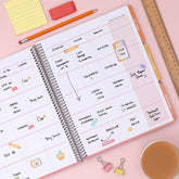 weekly spread featuring multi colored monthly tabs, ample lined writing space 
