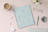 2024 monthly planner in a 8x10 planner size featuring silver binder, floral poppy flower on light blue background