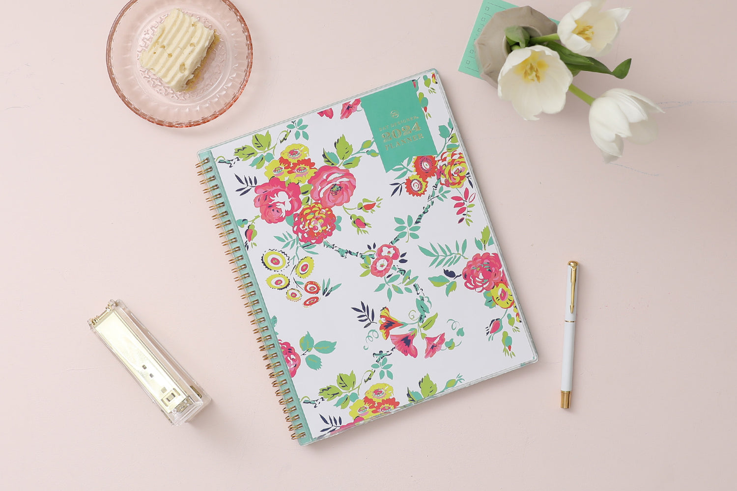 This January 2024 to December 2024 weekly monthly 5x8 planner featuring yellow and pink floral front cover pattern and gold twin wire-o binding