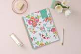 This January 2024 to December 2024 weekly monthly 5x8 planner featuring yellow and pink floral front cover pattern and gold twin wire-o binding