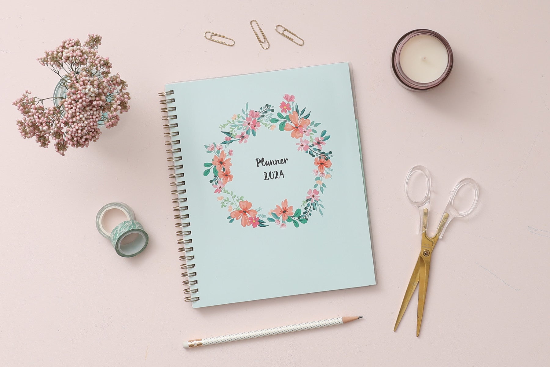 2024 weekly monthly planner in 7x9 size with mint background, gold binding and floral wreath