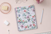 Blue Sky January 2024 - December 2024 weekly monthly planner featuring a floral front cover design with silver wire-o binding