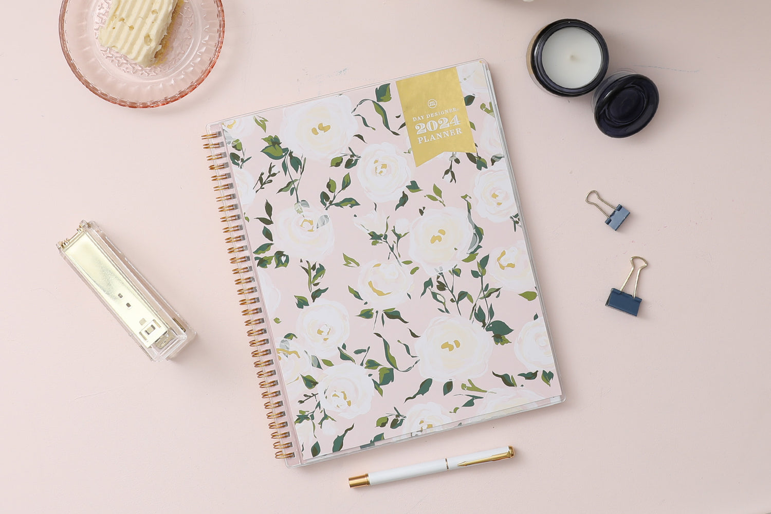 beautiful white, cream, and beige roses with soft green pedals and light pink background make this 2024 weekly monthly planner stand out 8.5x11