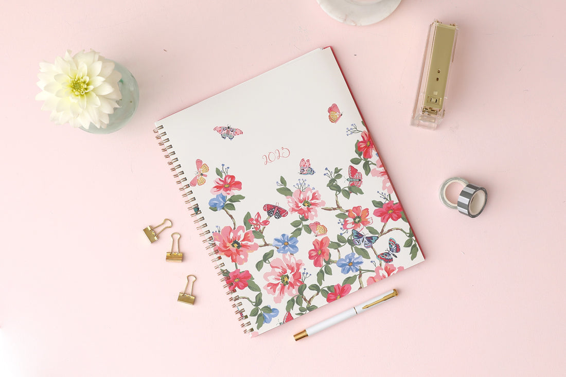 2024 blue sky floral cover and grey background weekly monthly planner in 8.5x11 planner size