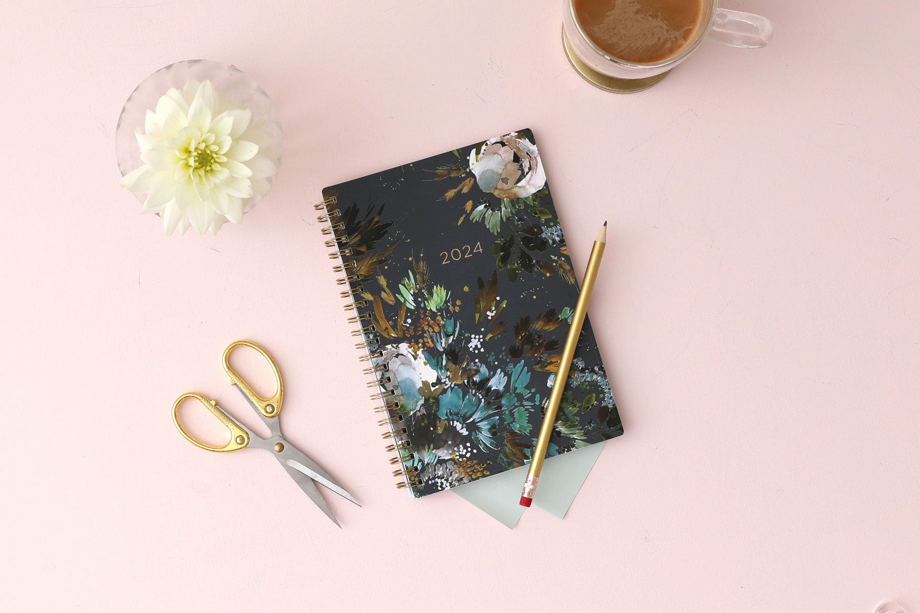 The kelly ventura 2024 weekly monthly planner for blue sky features beautiful watercolored floral cover with gold twin wire-o binding in a 5x8 planner size.