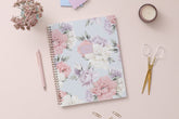 2024 weekly monthly planner featuring floral pattern and gold twin wire-o binding in 8.5x11 planner size