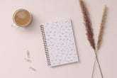 this one tree planted partnership planner for 2024 featuring a floral front cover with pink background and gold twin wire o binding in 3.625x6.125 pocket planner size.