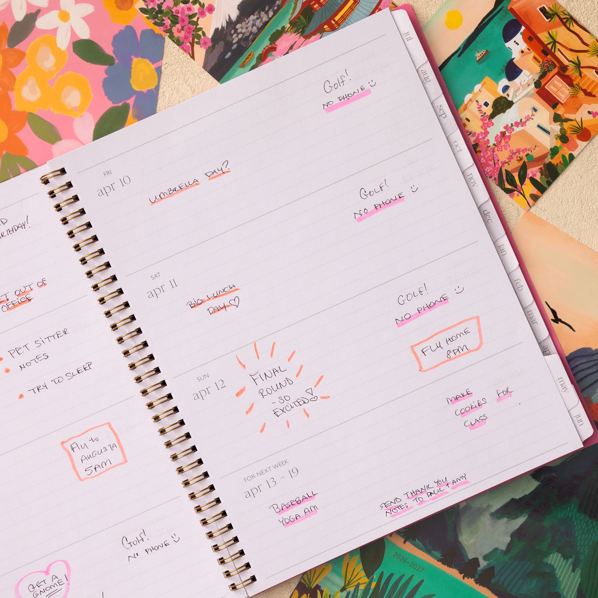 open spread weekly view of this 8.5x11 planner featuring lined writing space and white monthly tabs