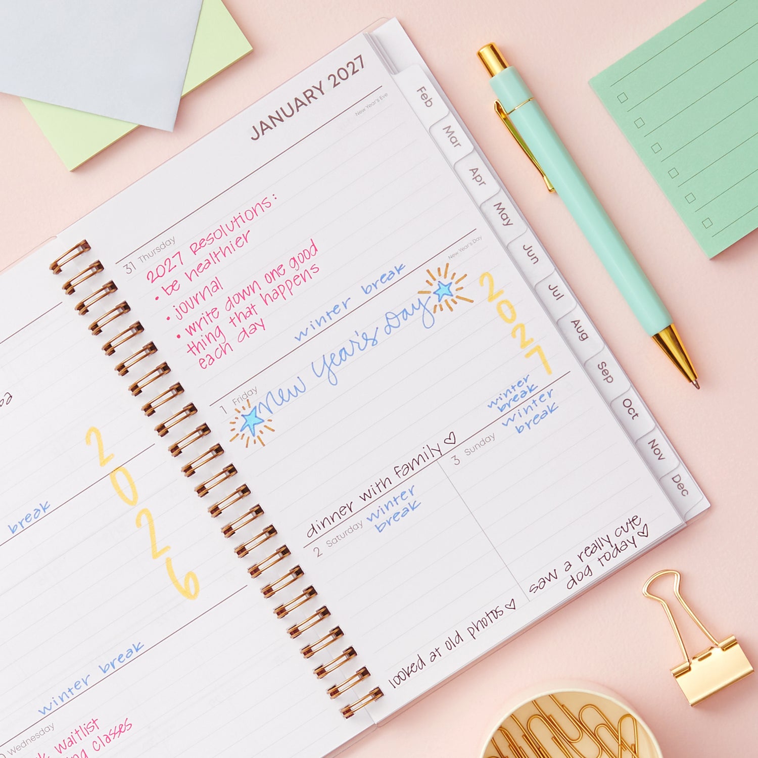 2027 weekly spread features ample lined writing space for to do lists, notes section, reference calendars, bullet points, and monthly tabs