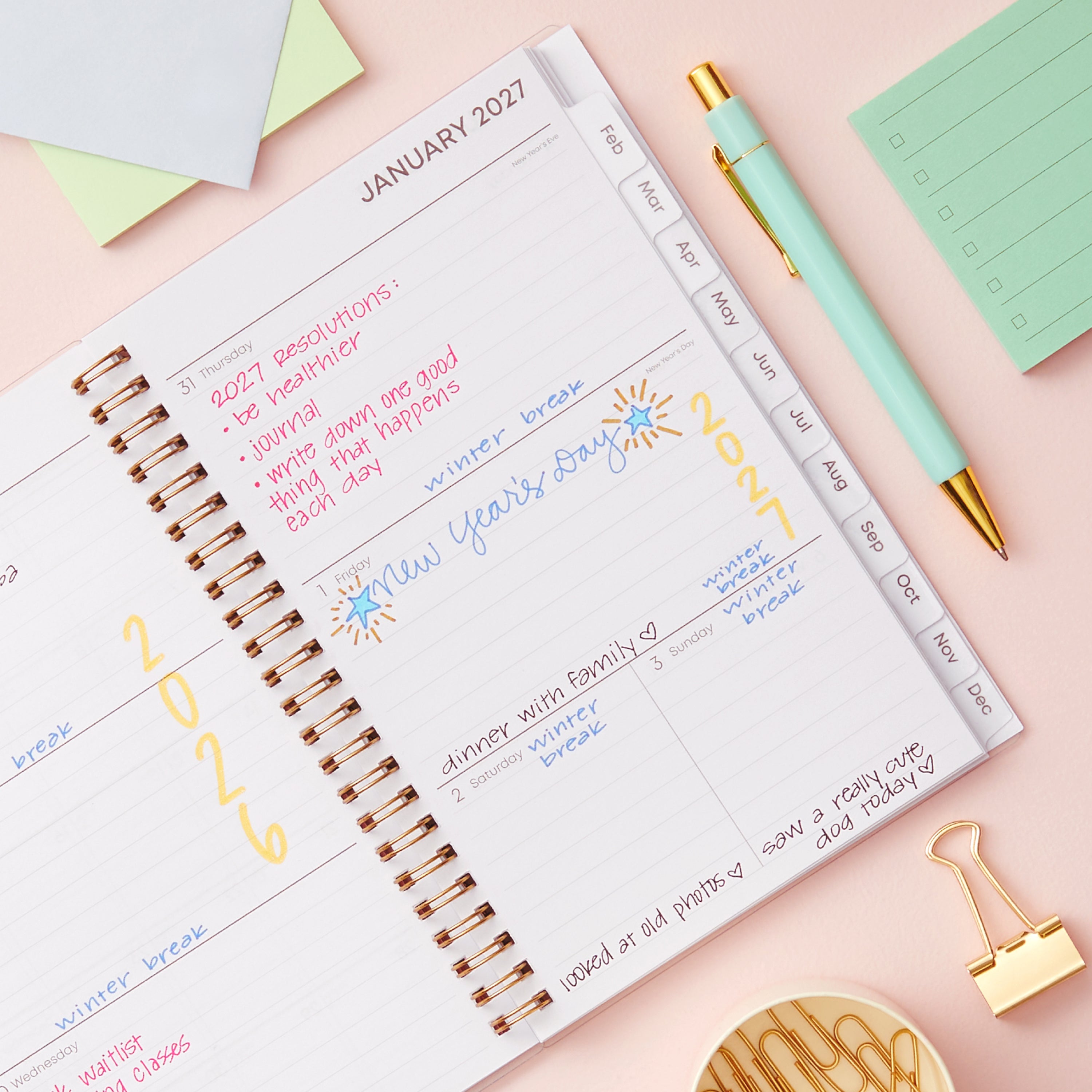 2027 weekly spread features ample lined writing space for to do lists, notes section, reference calendars, bullet points, and monthly tabs
