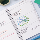 2027 weekly spread features ample lined writing space for to do lists, notes section, reference calendars, bullet points, and monthly tabs