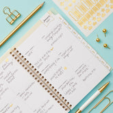 2027 weekly spread features ample lined writing space for to do lists, notes section, reference calendars, bullet points, and monthly tabs