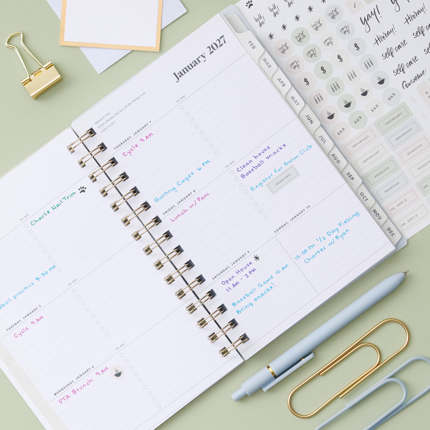 2027 weekly spread features ample lined writing space for to do lists, notes section, reference calendars, bullet points, and monthly tabs