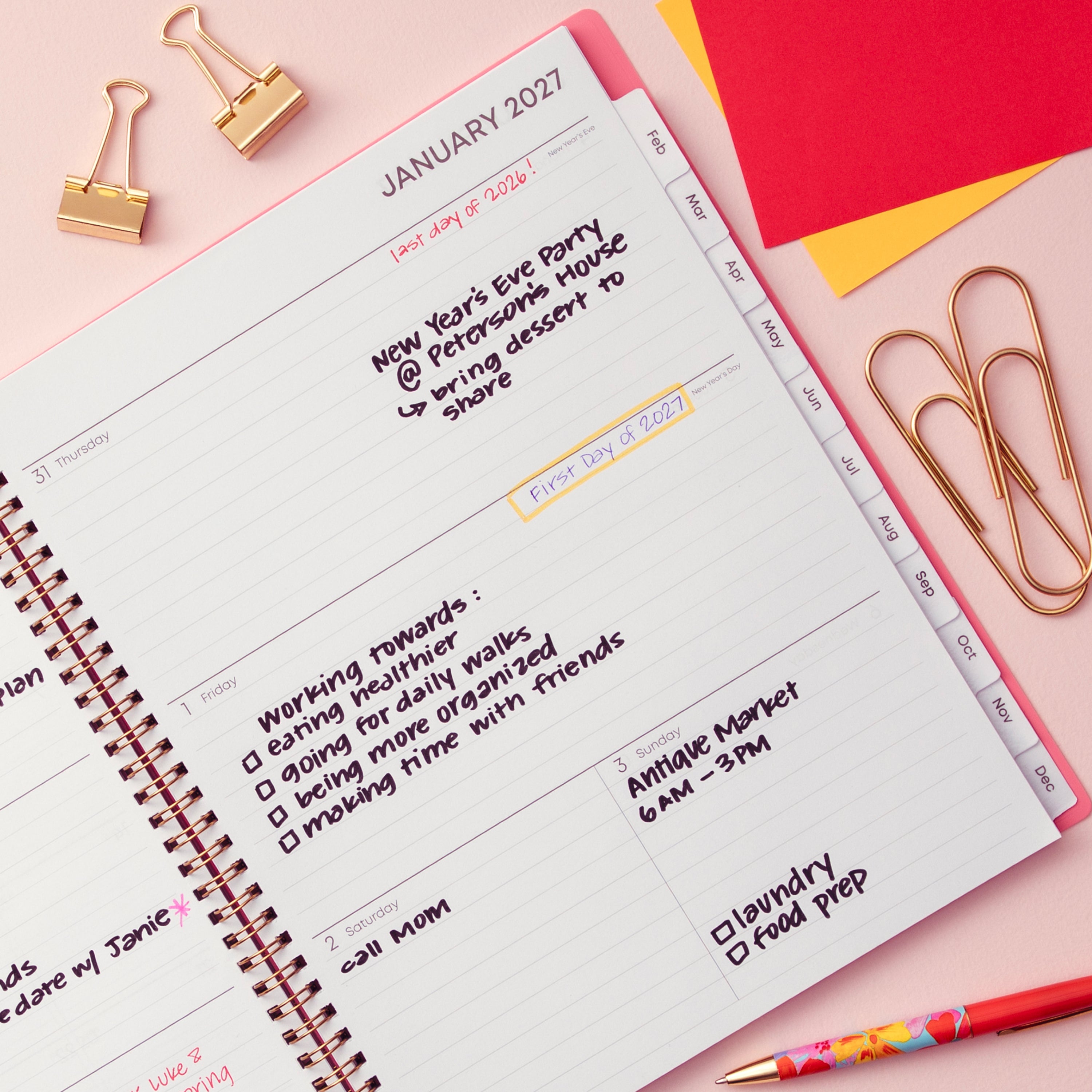 2027 weekly spread features ample lined writing space for to do lists, notes section, reference calendars, bullet points, and monthly tabs