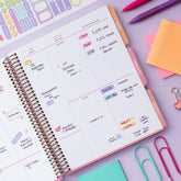 Weekly planner with new vertical layout and full spectrum color design, featuring dot grid and lined sections for notes with ample writing space 7x9 size