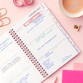 2027 weekly spread features ample lined writing space for to do lists, notes section, reference calendars, bullet points, and monthly tabs