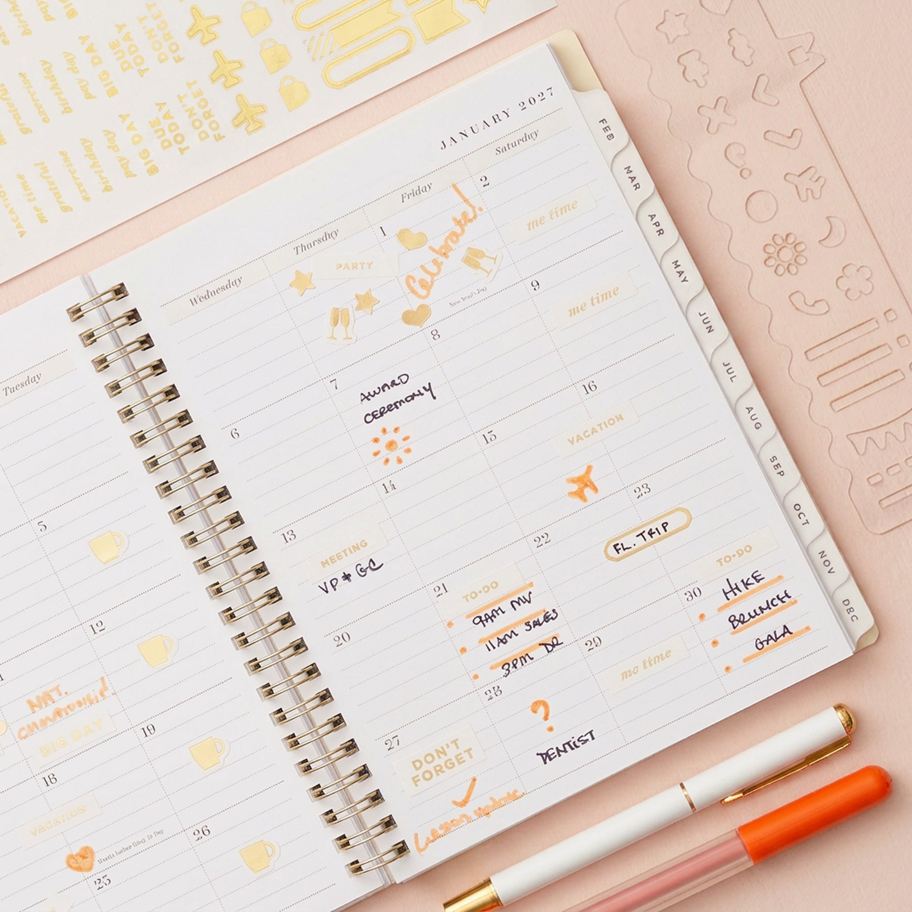 2027 monthly spread featuring ample lined writing space for each date, notes section, reference calendars, and monthly tabs