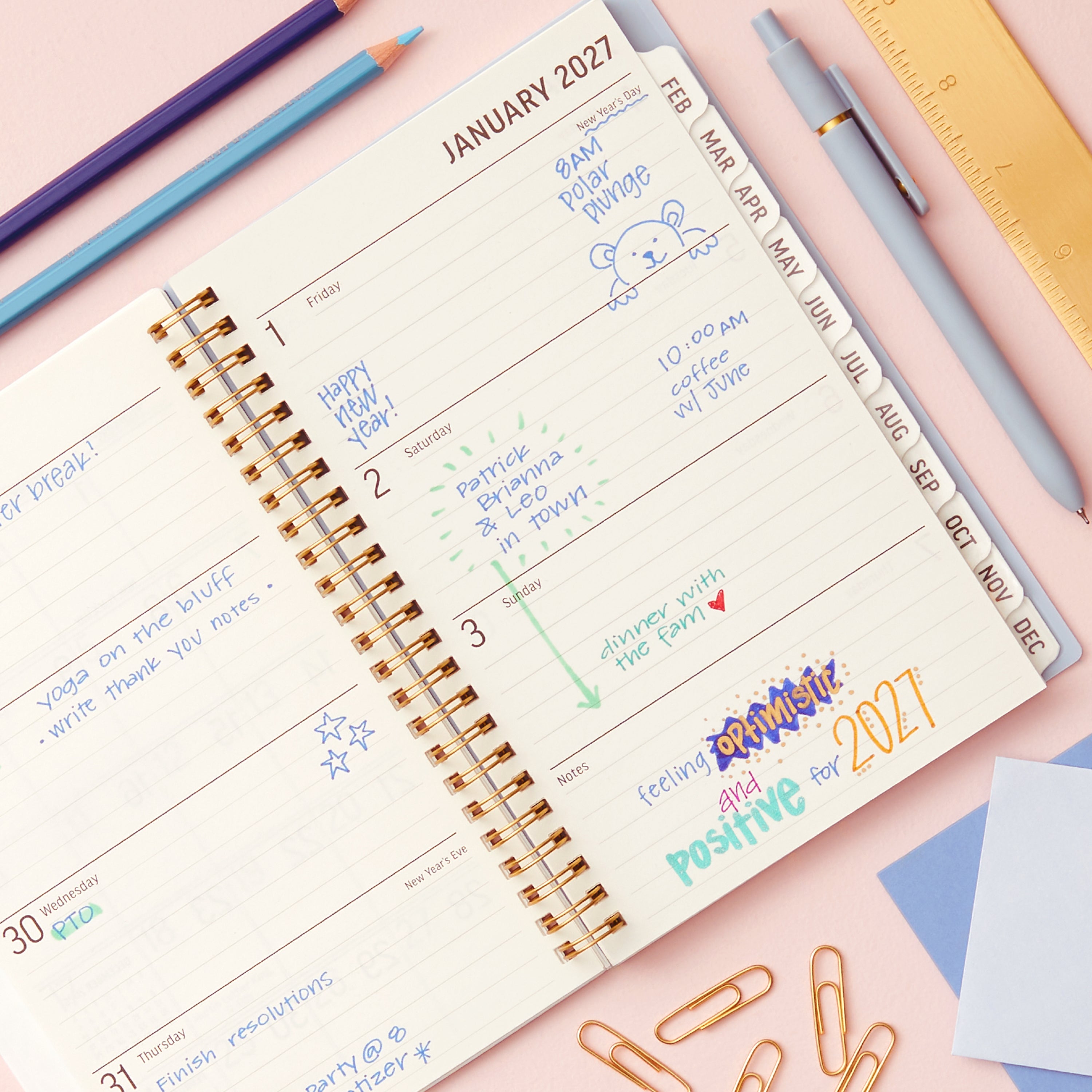 2027 monthly spread featuring ample lined writing space for each date, notes section, reference calendars, and monthly tabs