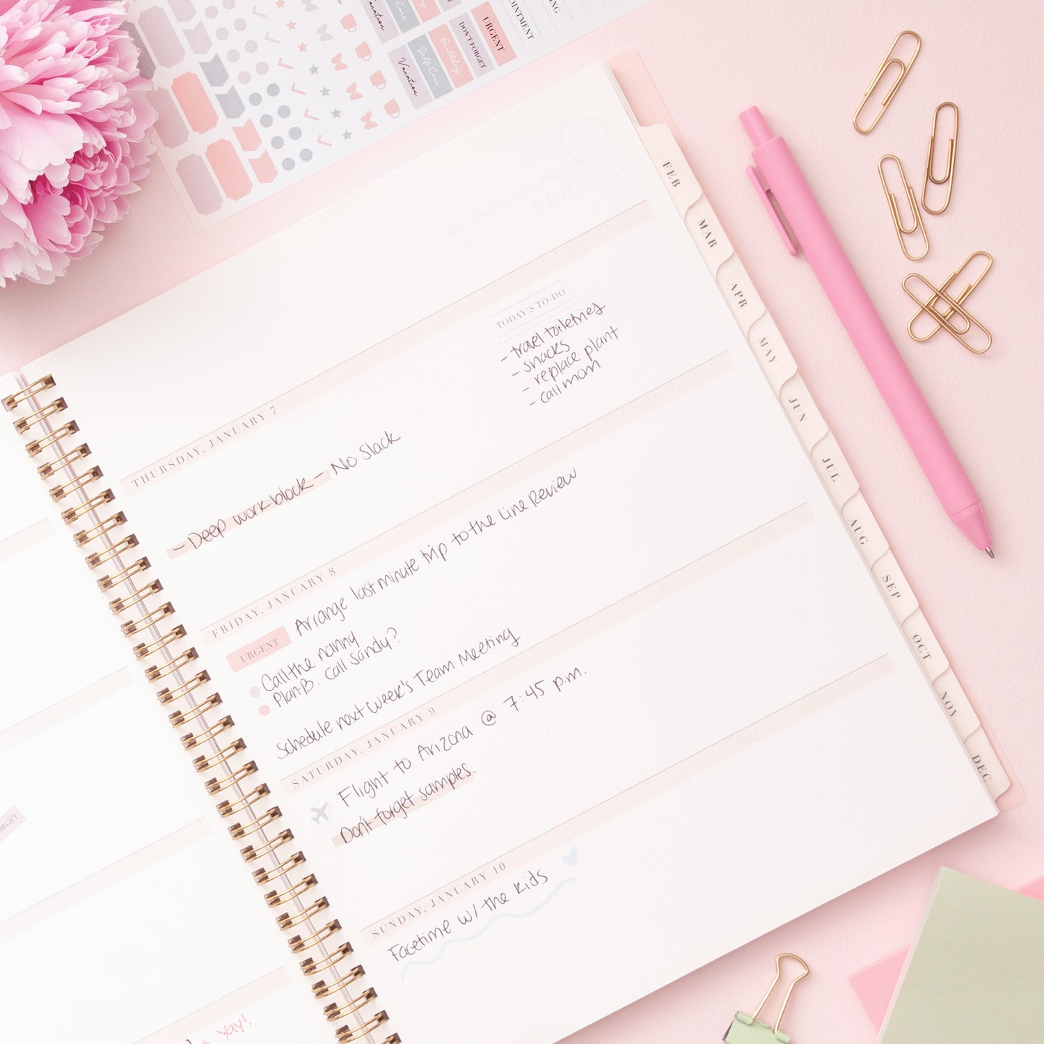 2027 weekly spread features ample open blank writing space for to do lists, notes section, reference calendars, bullet points, and monthly tabs