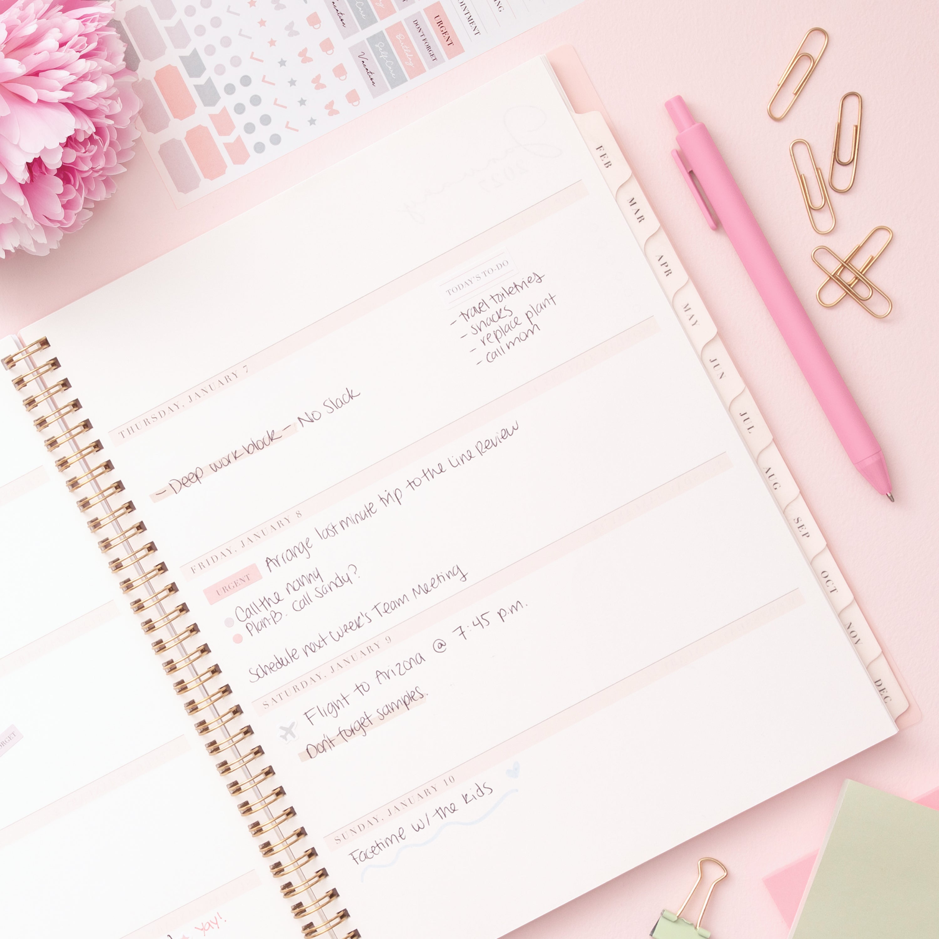 2027 weekly spread features ample open blank writing space for to do lists, notes section, reference calendars, bullet points, and monthly tabs