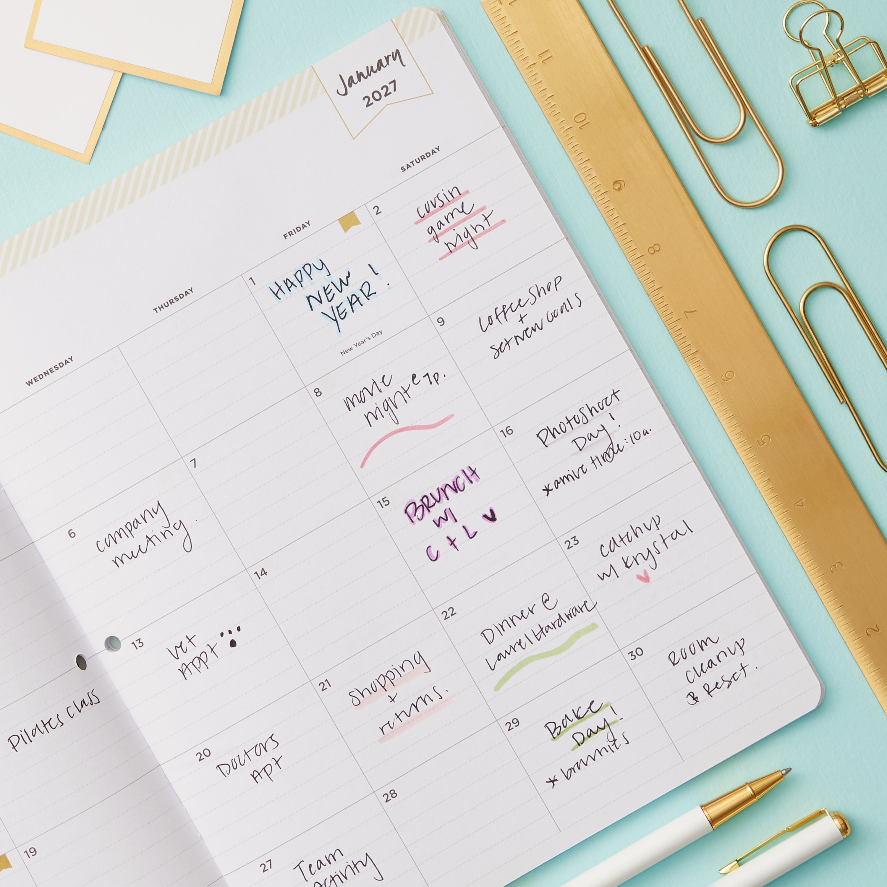 2027 monthly spread featuring ample lined writing space for each date, notes section, reference calendars, and monthly tabs