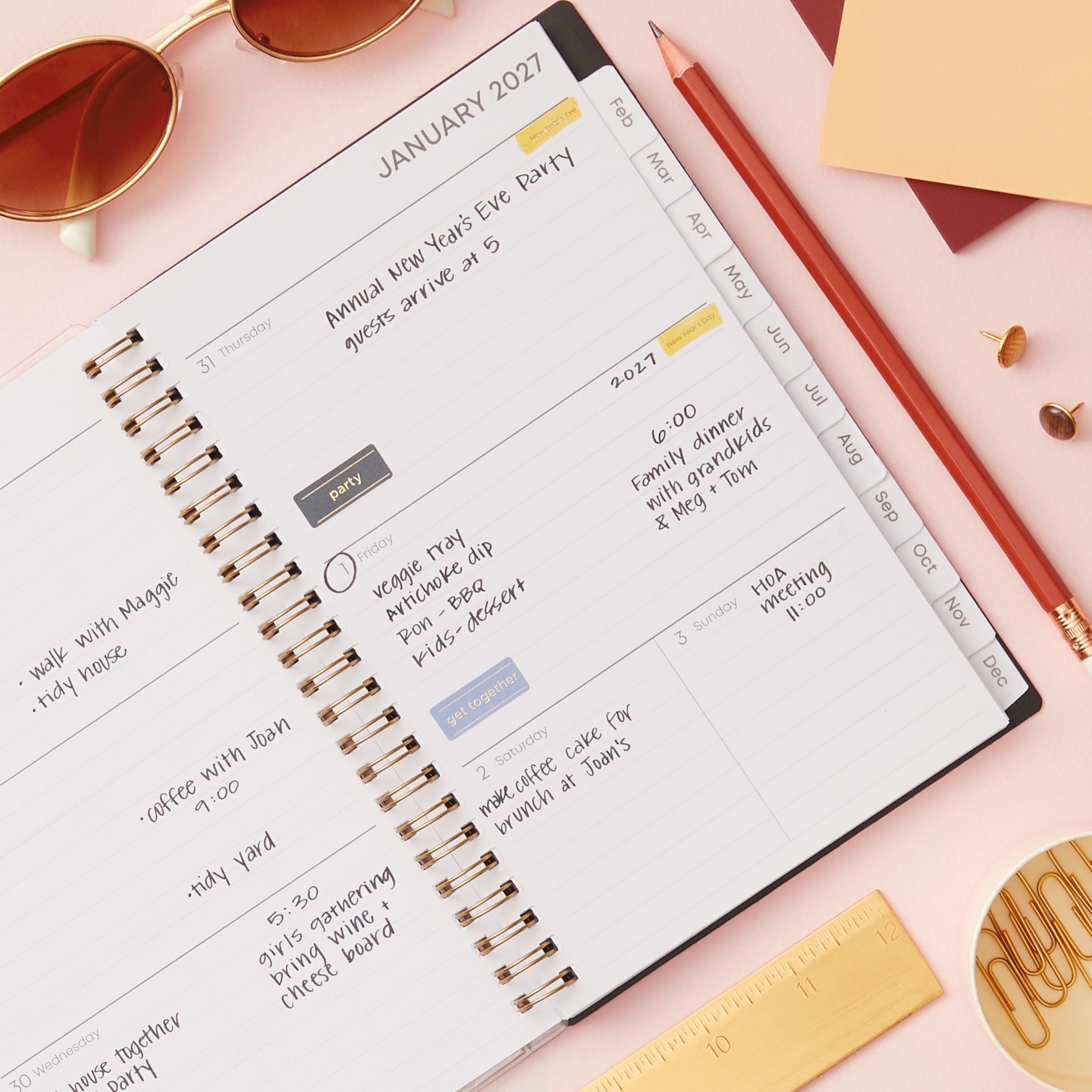 2027 weekly spread features ample lined writing space for to do lists, notes section, reference calendars, bullet points, and monthly tabs