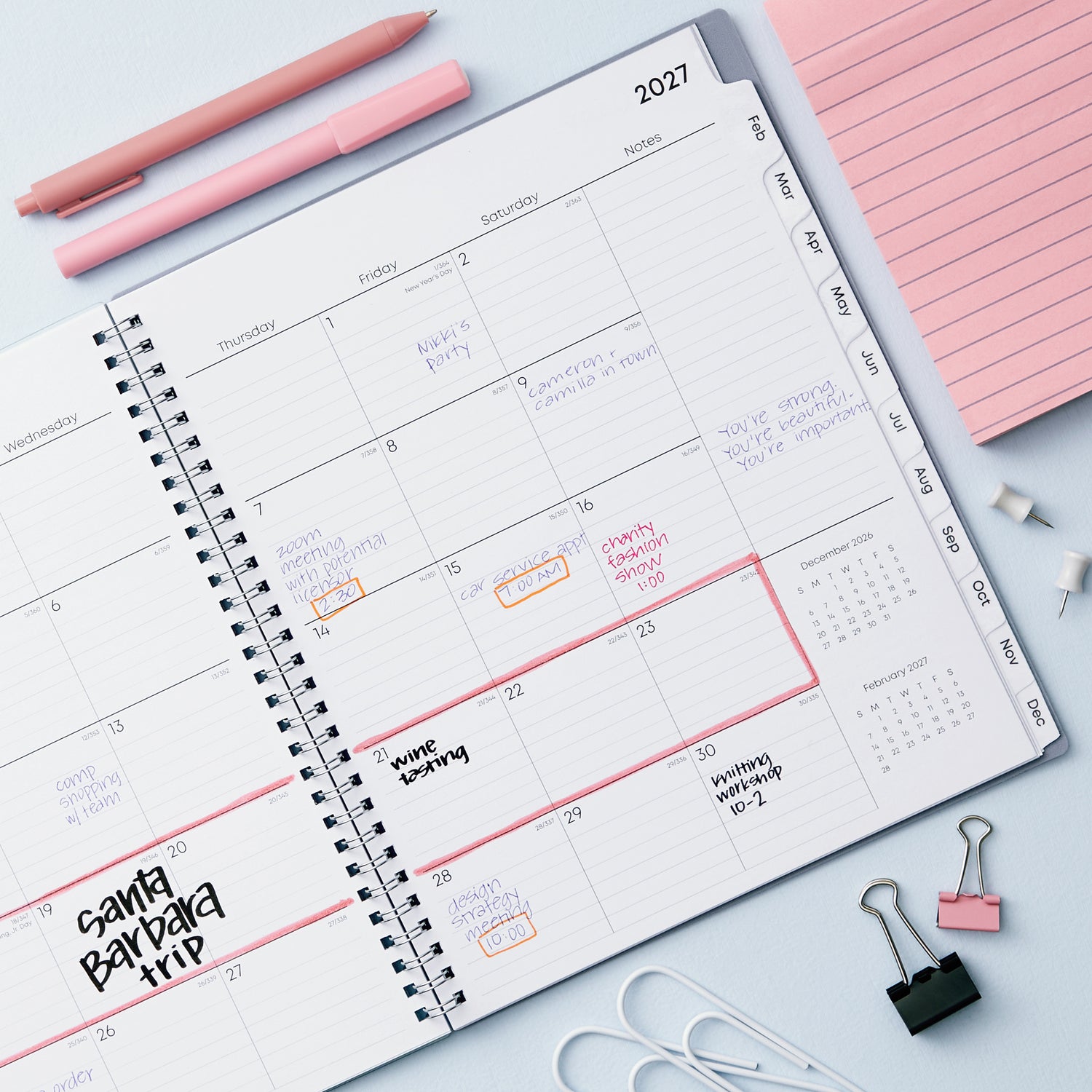 2027 weekly spread features ample lined writing space for to do lists, notes section, reference calendars, bullet points, and monthly tabs