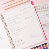 2027 weekly spread features ample lined writing space for to do lists, notes section, reference calendars, bullet points, and monthly tabs