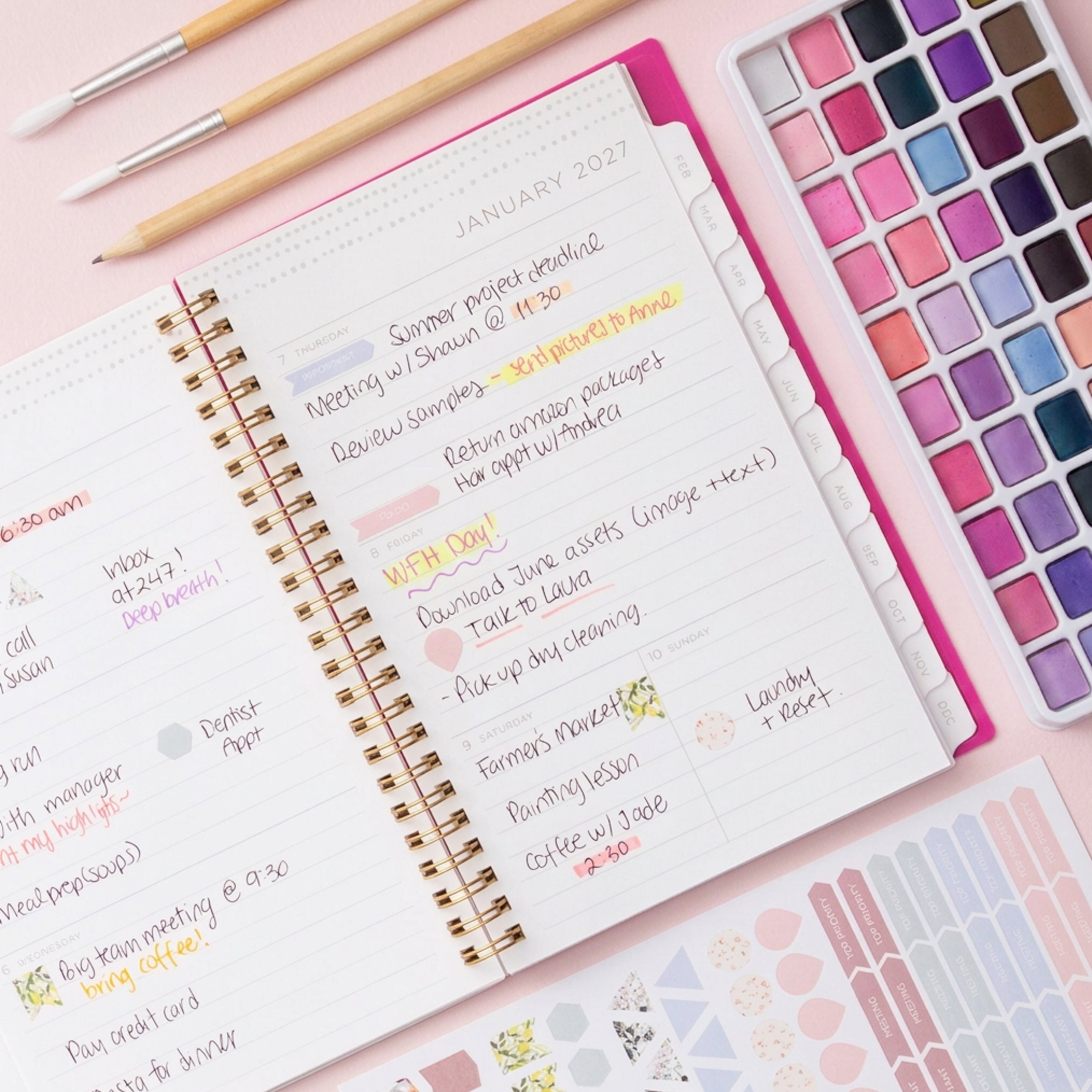 2027 weekly spread features ample lined writing space for to do lists, notes section, reference calendars, bullet points, and monthly tabs