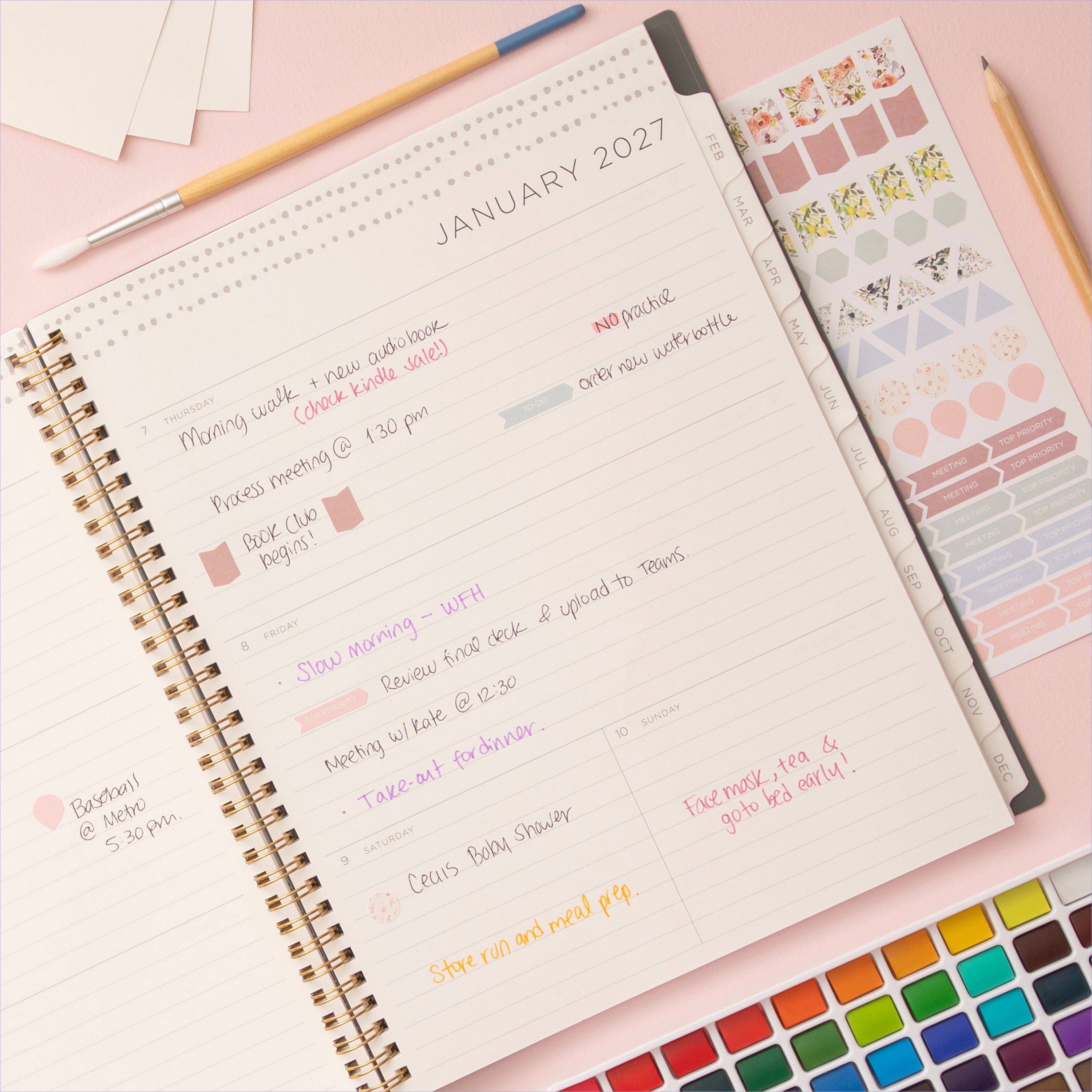 2027 weekly spread features ample lined writing space for to do lists, notes section, reference calendars, bullet points, and monthly tabs